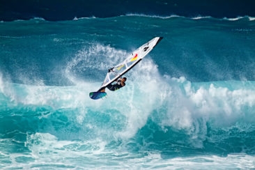Maui Windsurfer Pro flies off a wave.