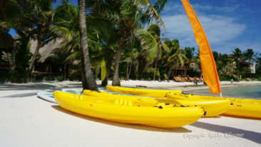 Kayaks on the beach of Ambergris Caye Belize