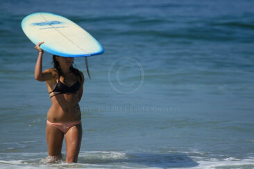 Lone Surfer Girl